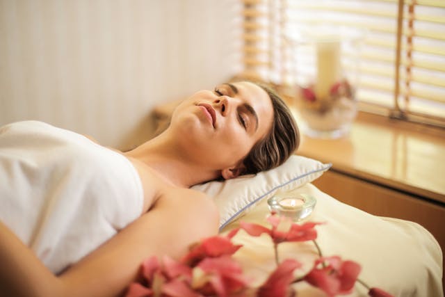this is a picture of a relaxed woman, nurturing and caring for herself. Many women find it hard to relax and feel their lives are a blur of stress anxiety exhaustion. Want to heal this in you, then visit the Yoga Lodge Epsom.